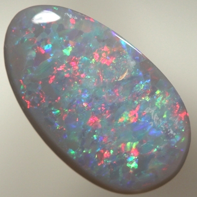 SOLID SEMI BLACK OPAL Bright sparkling reds over green and blue
